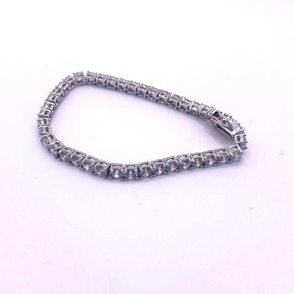 Silver Plated and Rhodium Tenis Bracelet with Cubic Zirconia Crystals 7” inches - Picture 3 of 5